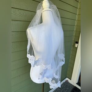 White tulle fingertip lace and pearl edged 35” long Vail